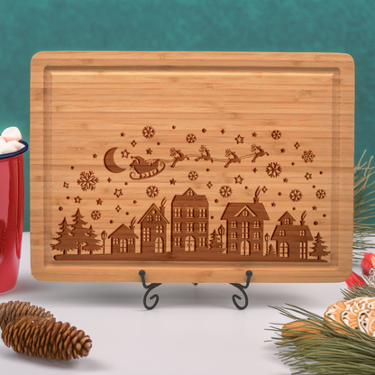 Engraved Christmas Cutting Board – Santa & Reindeer Flying Over Village Scene