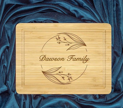 Custom Engraved Cutting Board with Floral Family Name Design for Special Occasions